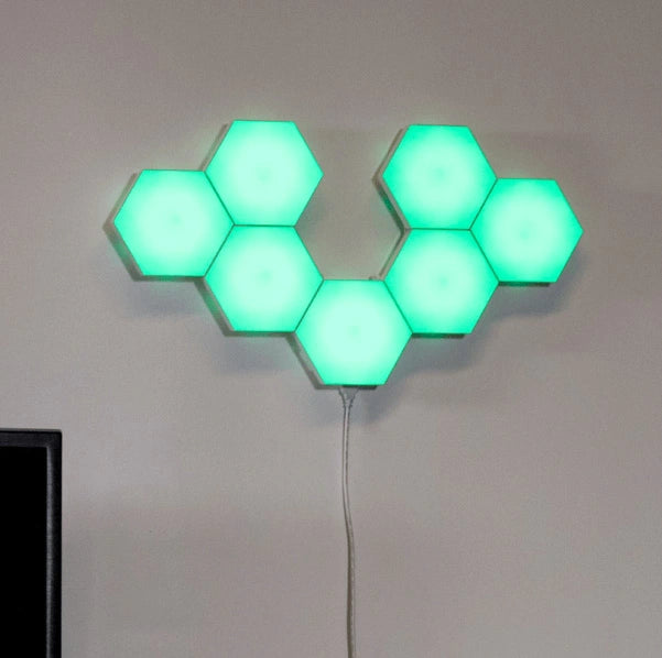HEXlights Smart mounted on a wall displaying light effects