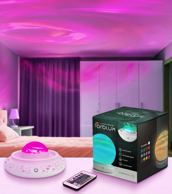 Bedroom with purple lighting effects, orblux product on a table.